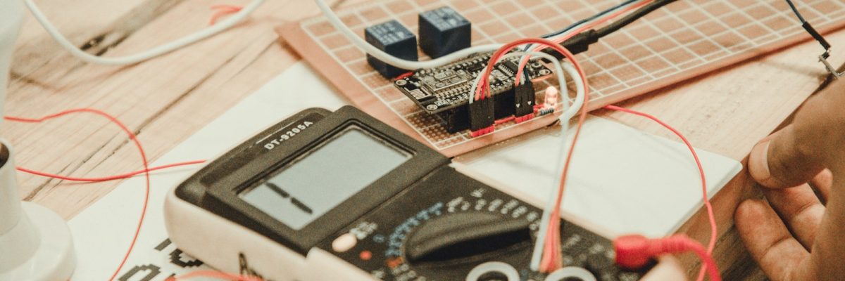 person uses white multimeter