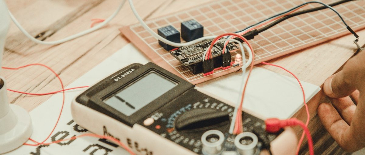 person uses white multimeter